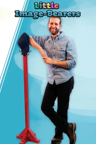 Little Image Bearers kids poster featuring a man posing with a red prop on a light background.